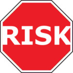 Red Risk Road warning sign - risk factors to bringing your idea to business